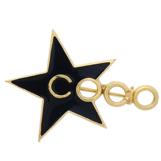 Chanel Coco Star Brooch Pin Black 01P in Black from AMORE Vintage Tokyo