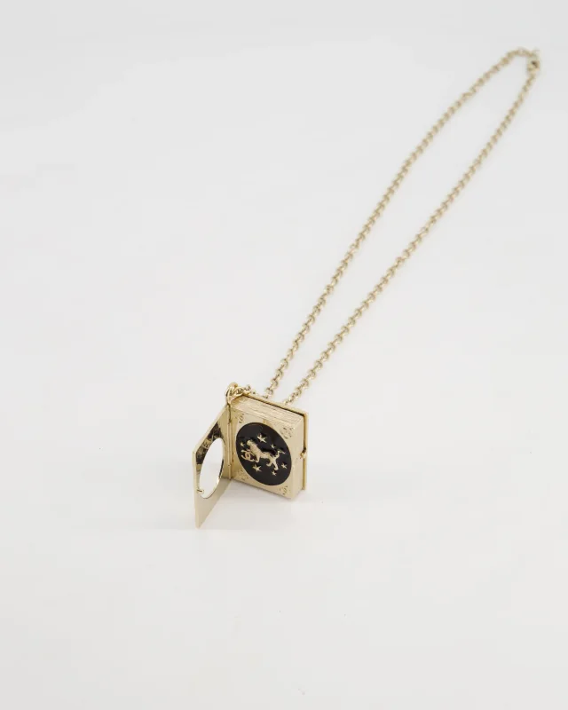 Chanel Champagne Gold, Star Lion and CC Logo Book Pendant Necklace in Gold from Sellier, photo 5 of 7