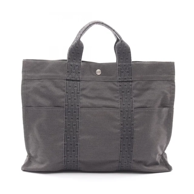 Hermès Tote Bag Herline MM Dark Gray Canvas Her MM in Grey Canvas from The Reluxe
