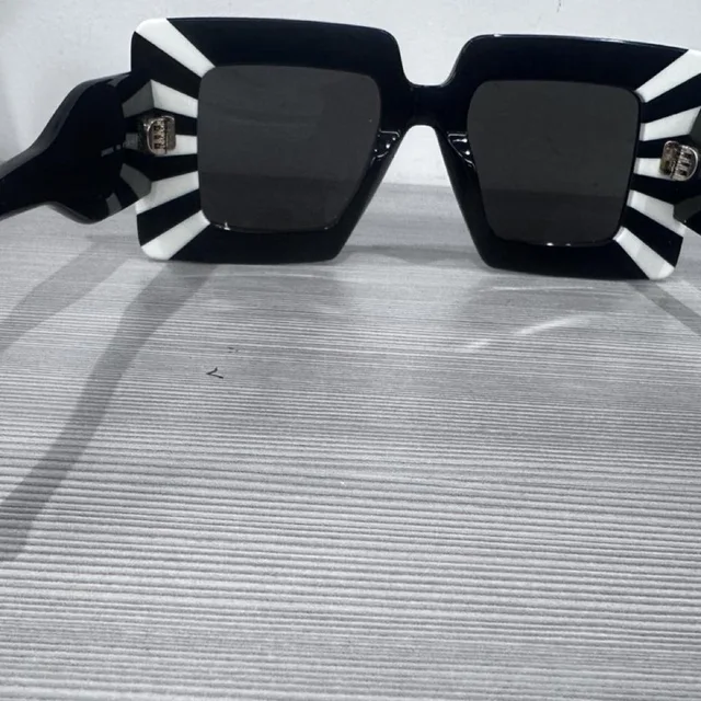 Loewe Women's Sunglasses - Black in black from Depop, photo 1 of 1