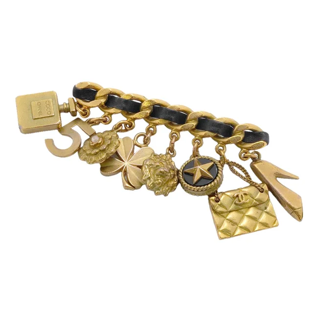Chanel Brooch Vintage CC Logo Camellia Icon Charm Gold Plated Leather Faux in Gold Leather from The Reluxe