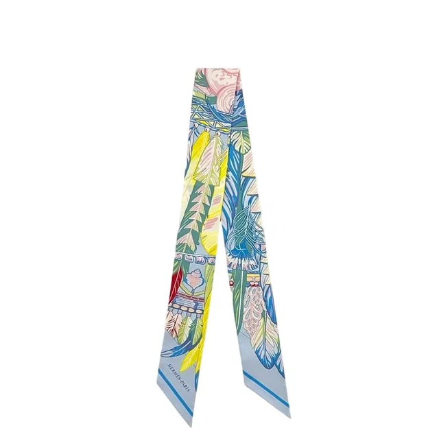 Hermès Twilly Ribbon Scarf Twilight Blue Yellow Dance Pacific Already Cleaned Silk in Blue Silk from The Reluxe