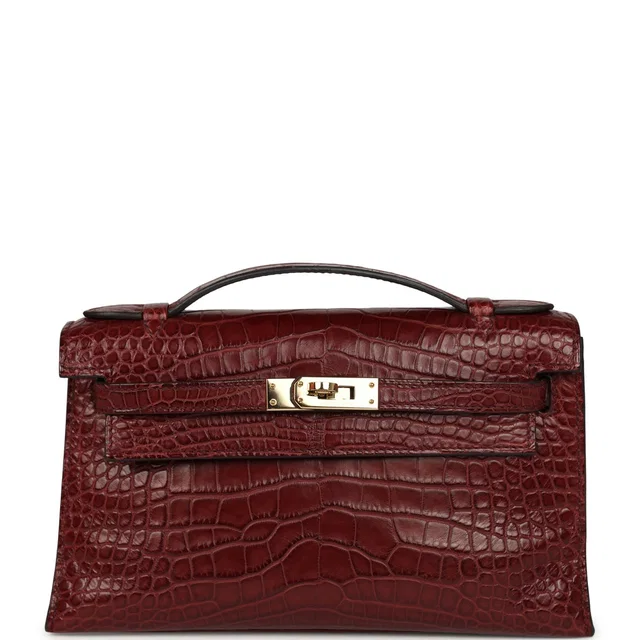 Hermès Kelly Pochette Bordeaux Matte Alligator Mississippiensis Permabrass Hardware in Burgundy Crocodile from Madison Avenue Couture