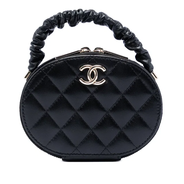 Black Chanel CC Quilted Lambskin Oval Top Handle Clutch Handbag in Black Lambskin from Designer Revival