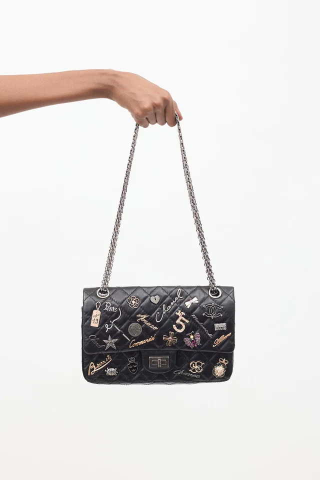 Chanel 2006 Black Leather 2.55 Reissue Lucky Charms Double Flap Bag in Black Leather from VSP Consignment