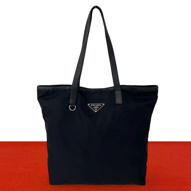 Prada Triangle Logo Tessuto Pocono Nylon Leather Tote Bag Black in Black Nylon from The Reluxe