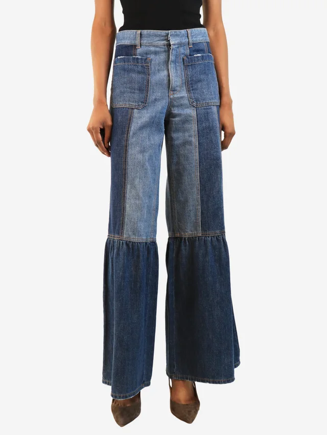 Dior Blue flared patchwork jeans - size UK 6 in Blue from Sign of the Times