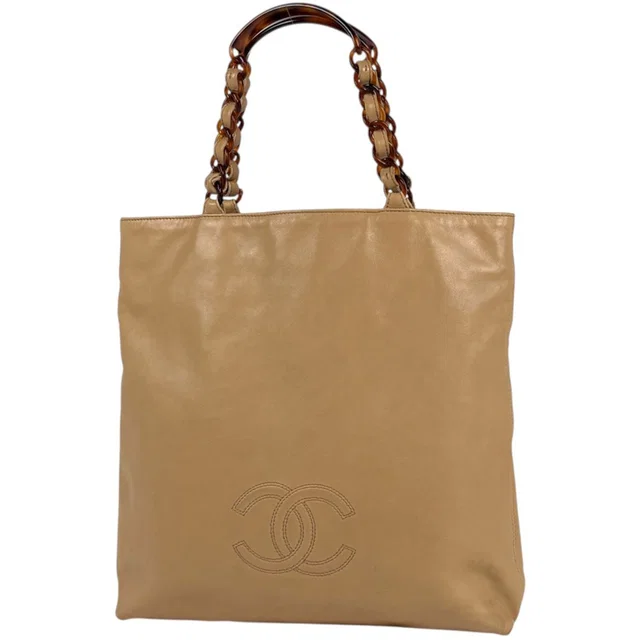 Chanel Tote Bag CC Logo Leather Beige in Beige Leather from The Reluxe