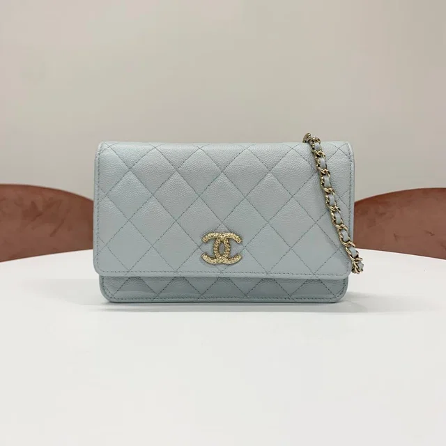 Chanel CC Logo Quilted Chain Wallet Shoulder Bag in Caviar leather from The Reluxe
