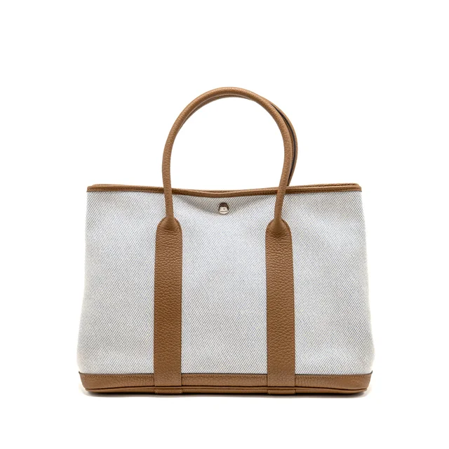 Hermès garden party 36 negonda/canvas ecru-bleu bill/alezan SHW stamp Z in Blue Canvas from EMIER