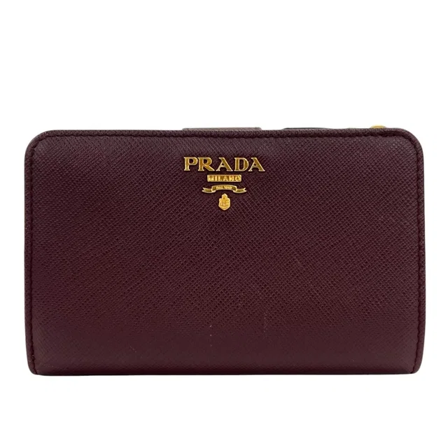 Prada Logo Bifold Saffiano Leather Ivory Burgundy Pink Wallet in White Saffiano leather from The Reluxe