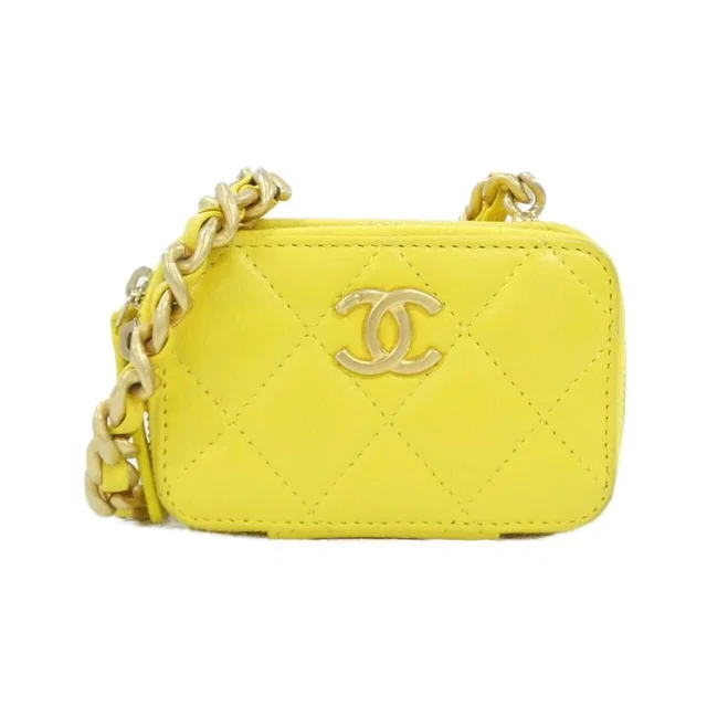 Chanel Chain Clutch Yellow in Yellow Leather from The Reluxe