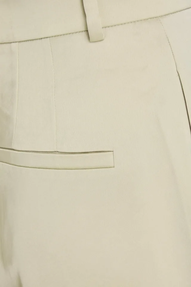 Nanushka Pleated Satin Wide-Leg Pants in Ecru, photo 4 of 4 from THE OUTNET