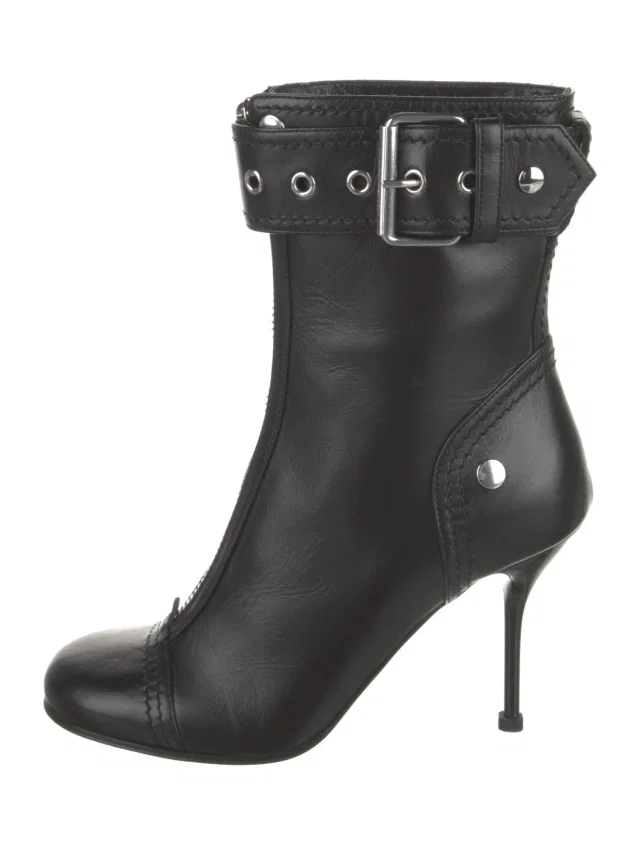 Alexander McQueen Leather Moto Boots in black Leather from The RealReal