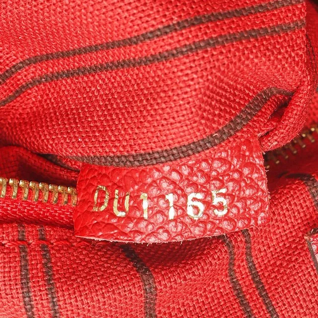 Louis Vuitton Monogram Empreinte Speedy Bandoulière 25 Bag in Leather from A Retro Tale, photo 7 of 8