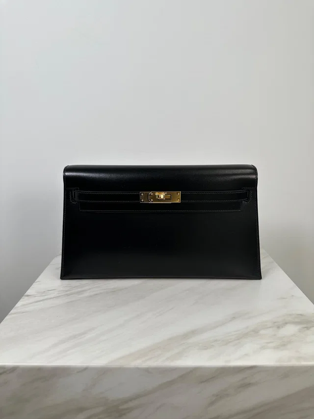 Hermès Kelly Elan Black Box Gold Hardware in Black Box leather from Luxury Promise