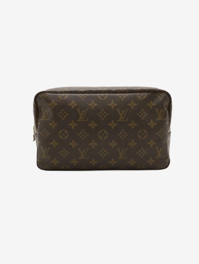 Louis Vuitton Brown vintage Monogram toiletry bag in Brown Canvas from Sign of the Times