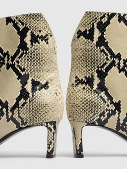 Khaite Stiletto heel ankle boots in 100% Calf, photo 4 of 5 from LUISAVIAROMA