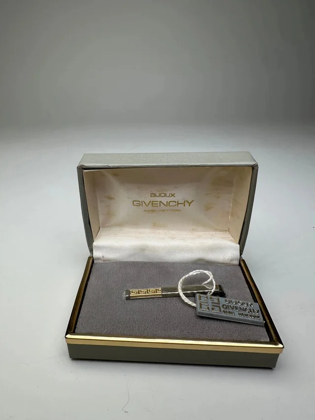 Givenchy Vintage Logo Brooch Silver Gold With Box in silver|gray from Grailed, photo 1 of 1