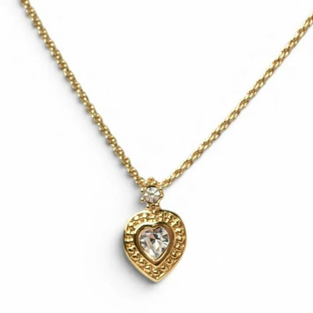 Dior Heart Necklace in gold from Poshmark