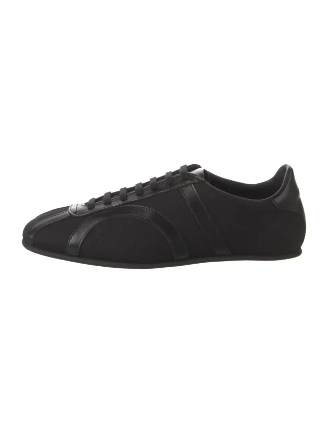 TOTEME Leather Sneakers in black Leather from The RealReal