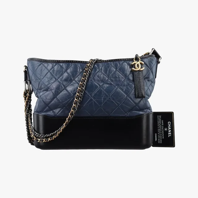 Chanel Gabrielle Black Navy Leather Handbag in Black Leather from The Reluxe