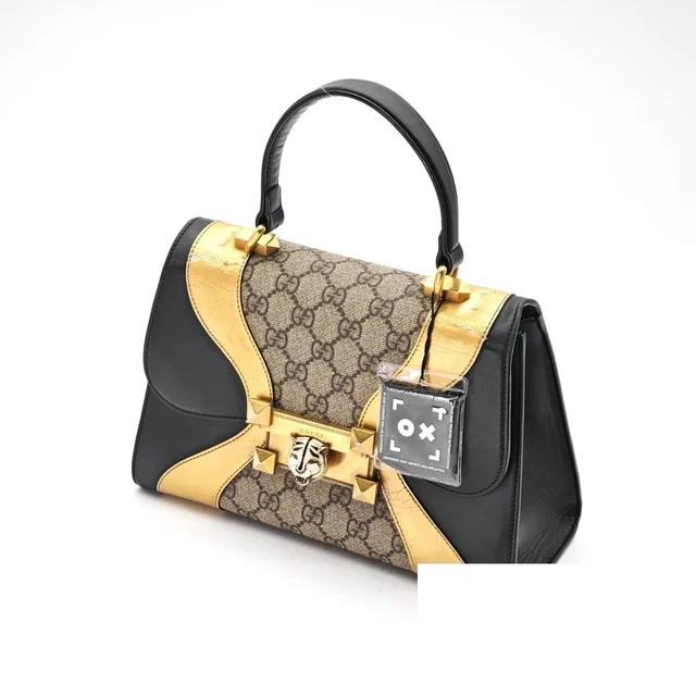 Gucci Tiger Head Handbag Bag Unique Black Gold Beige in Black Canvas from The Reluxe