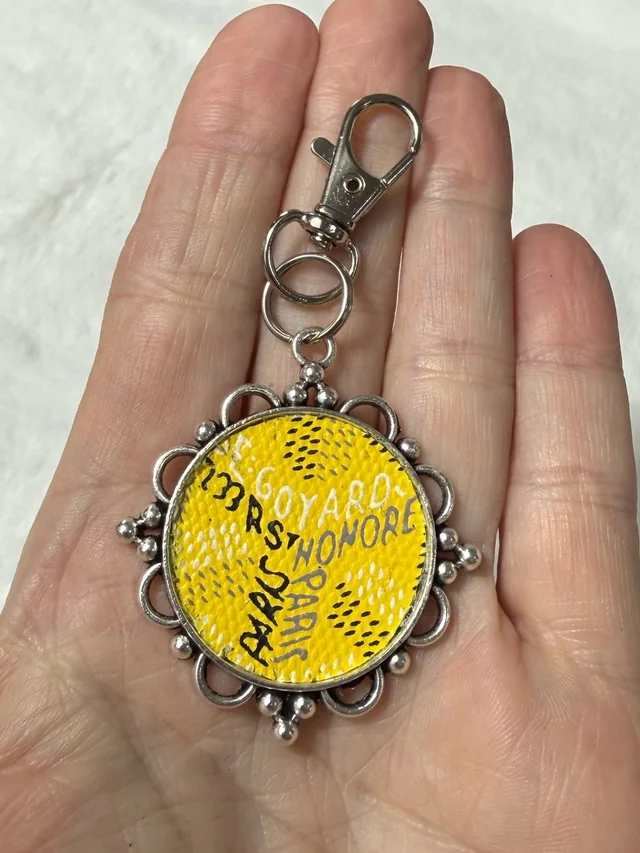 Goyard Upcycled Yellow Patterned Round Keychain Fob Clip in yellow from Poshmark, photo 1 of 1