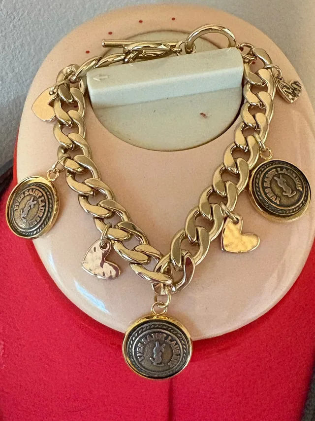 Saint Laurent Charms On Unbranded Bracelet Chain With Toggle Clasp in gold from Poshmark, photo 1 of 1