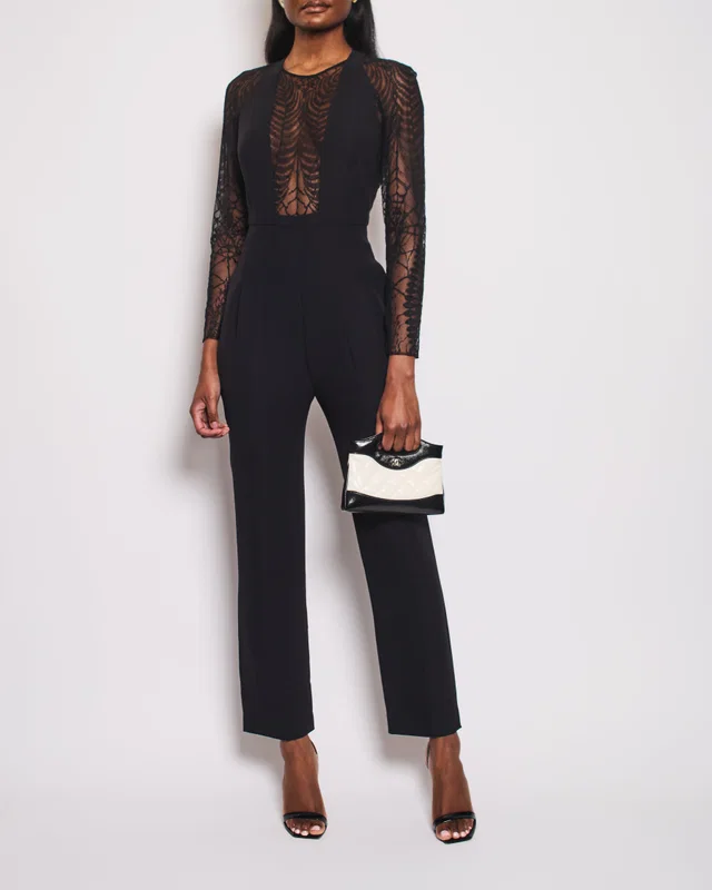 Gucci Black Laced Long Sleeve Jumpsuit IT 40 (UK 8) in Black Silk from Sellier