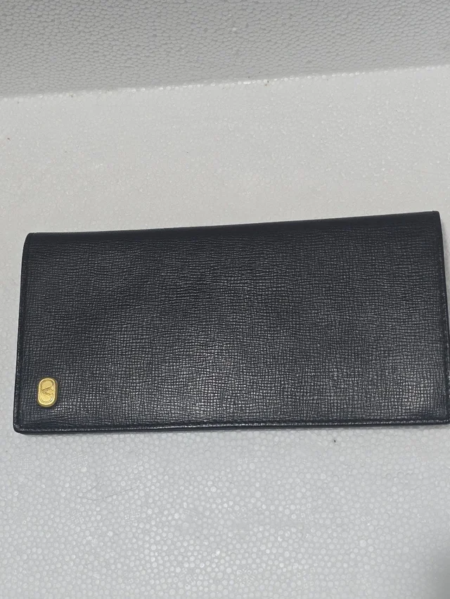 Valentino Garavani Long Bifold Wallet in black from Poshmark