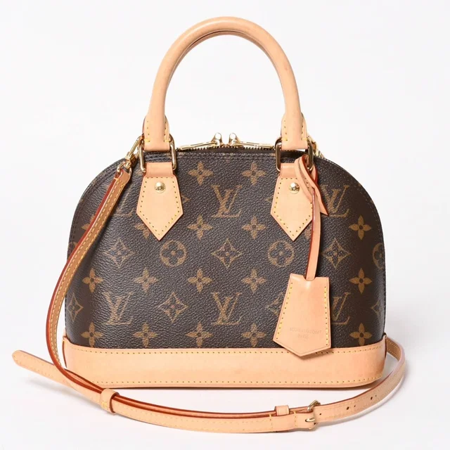 Louis Vuitton Monogram Alma BB Handbag Shoulder Gold in Gold Leather from The Reluxe