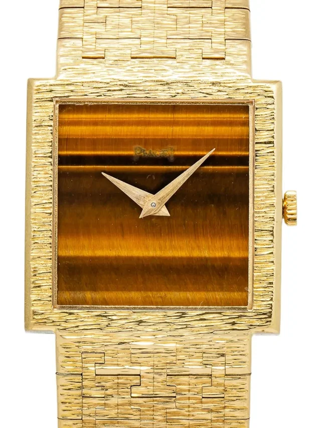 Piaget pre-owned Tiger Eye 23mm - unisex - Sapphire Crystal/18kt Yellow Gold - One Size - Brown in brown|red from Farfetch