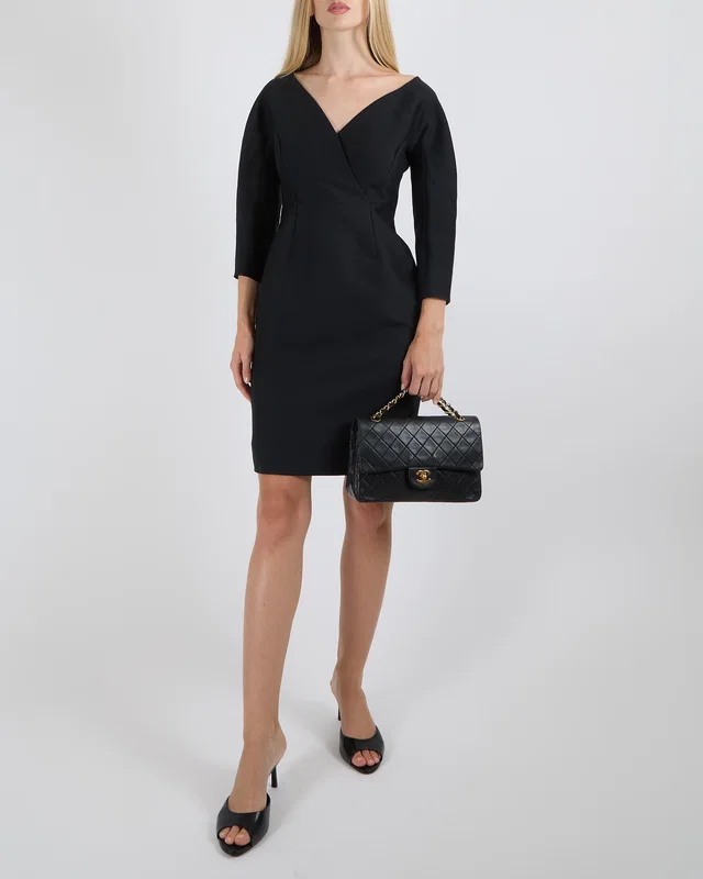 Gucci Black Wool and Silk Blend Long-Sleeved Rounded Shoulder Mini Dress Size IT 38 (UK 6) in Black Silk from Sellier