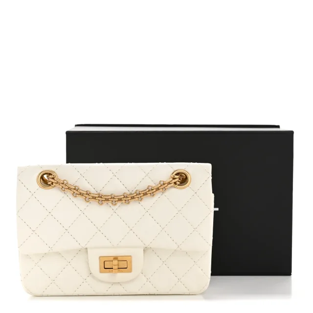 Chanel Aged Calfskin Quilted 2.55 Reissue Mini Flap White in White Calfskin from FASHIONPHILE, photo 14 of 14