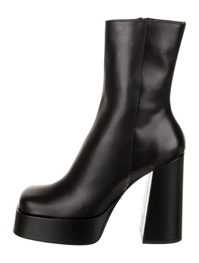 Versace boots in black Leather from The RealReal