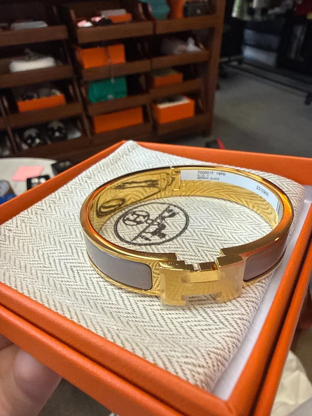Hermès clic clac h bracelet Grey Yellow Gold in Grey from Luxury Promise