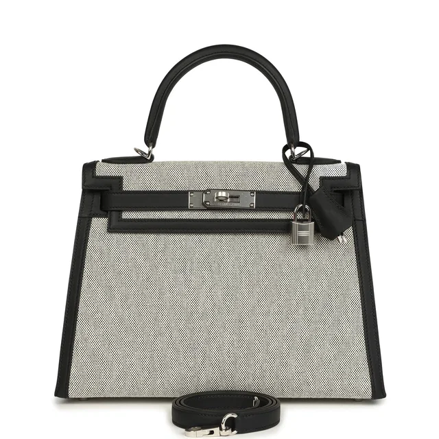 Hermès Kelly Sellier 28 Black Swift and Ecru-Black Toile H Canvas Palladium Hardware in Black Swift leather from Madison Avenue Couture