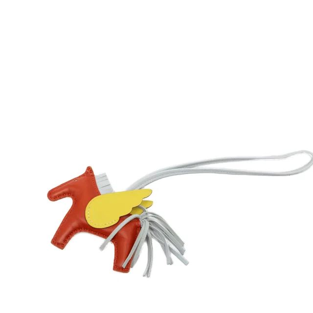 Orange Hermès Milo Lambskin and Swift Grigri Rodeo Pegase Bag Charm PM Key Chain in Orange Swift leather from Designer Revival