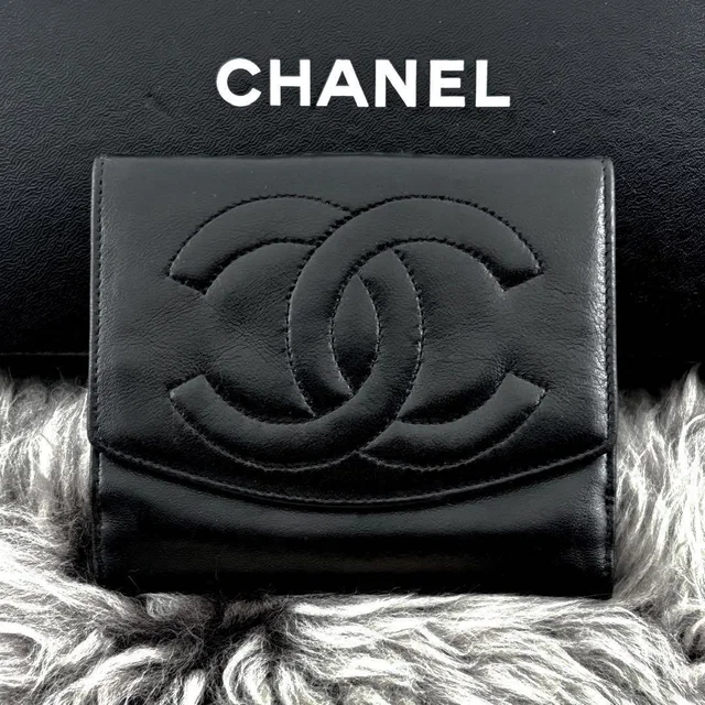 Chanel Wallet Coco Stitch Jumbo CC Logo Snap Bifold in Caviar leather from The Reluxe