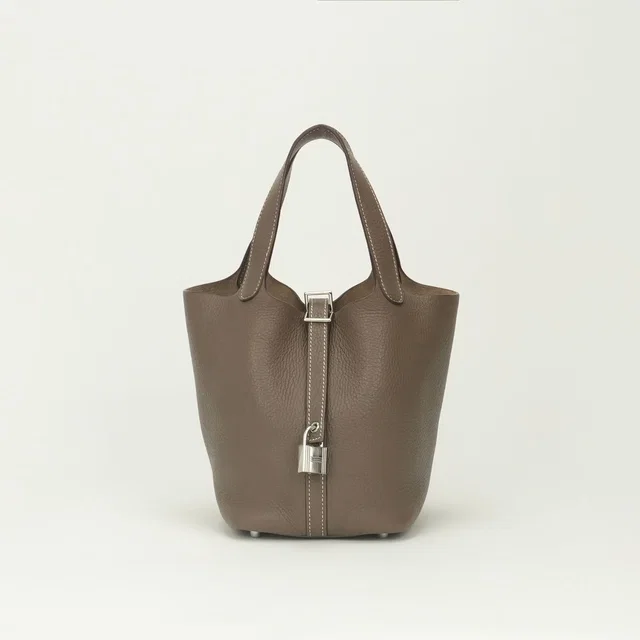Hermès Picotin Lock PM 18 Tote Bag Taurillon Clemence Etoupe Gray Silver in Taupe Clemence leather from The Reluxe