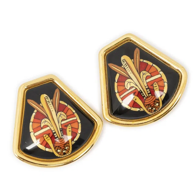Hermès Inlaid Clip on Earrings Black Red Skull and Sunburst Motif in Black from The Reluxe