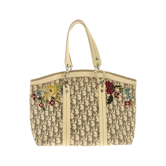 Dior Vintage Bag Handbag Ivory in White Canvas from The Reluxe