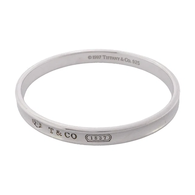 Tiffany & Co. Bangle Narrow 925 Sterling Silver Bracelet in Silver from The Reluxe