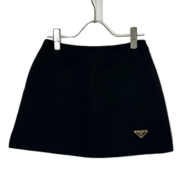 Prada Triangle Logo Wool Mini Skirt 38 in Black Wool from The Reluxe