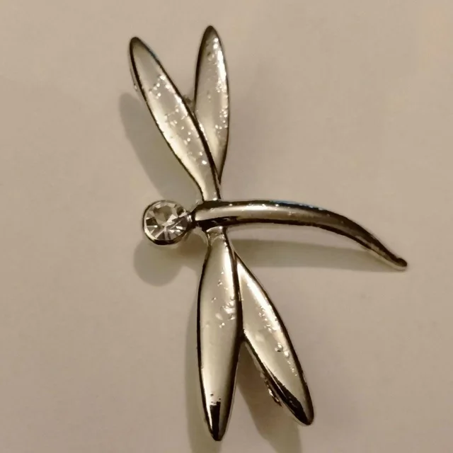 The Row Women's Brooch - Silver in silver|gray from Depop, photo 1 of 1