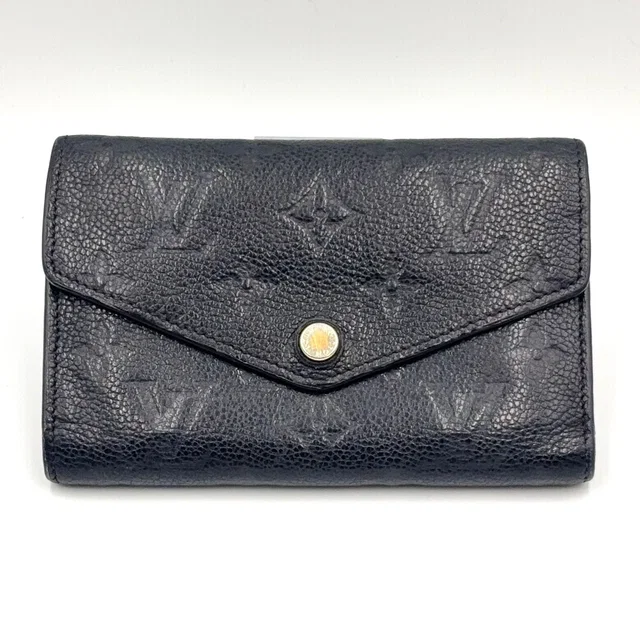 Louis Vuitton Portefeuille Compact Monogram Empreinte Noir Leather Black in Black Leather from The Reluxe