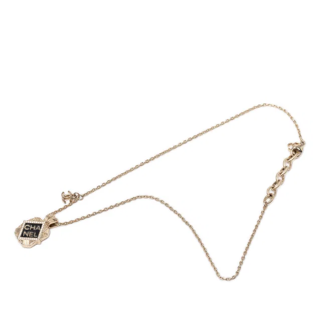 Gold Chanel Gold Plated Enamel and Strass Pendant Necklace in Gold from Designer Revival