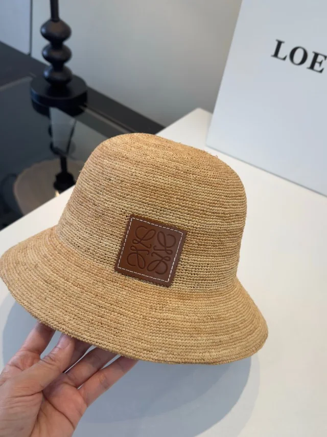 Loewe Natural Woven Straw Bucket Hat in brown|neutral Woven leather from Poshmark, photo 1 of 1