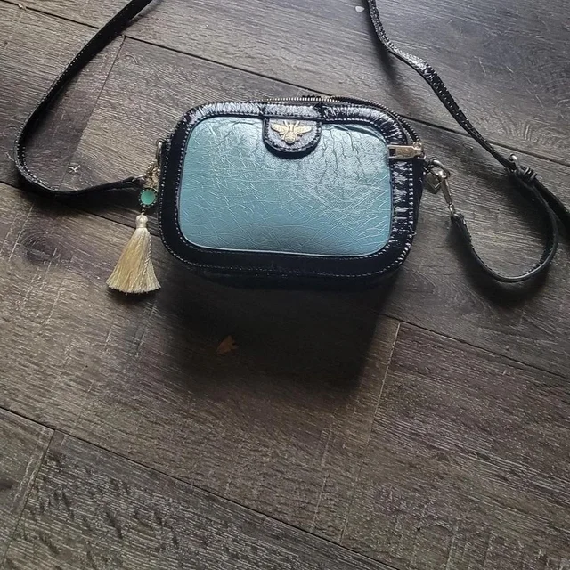 Bvlgari Kids' Bag - Blue/Black in black|blue from Depop, photo 1 of 1